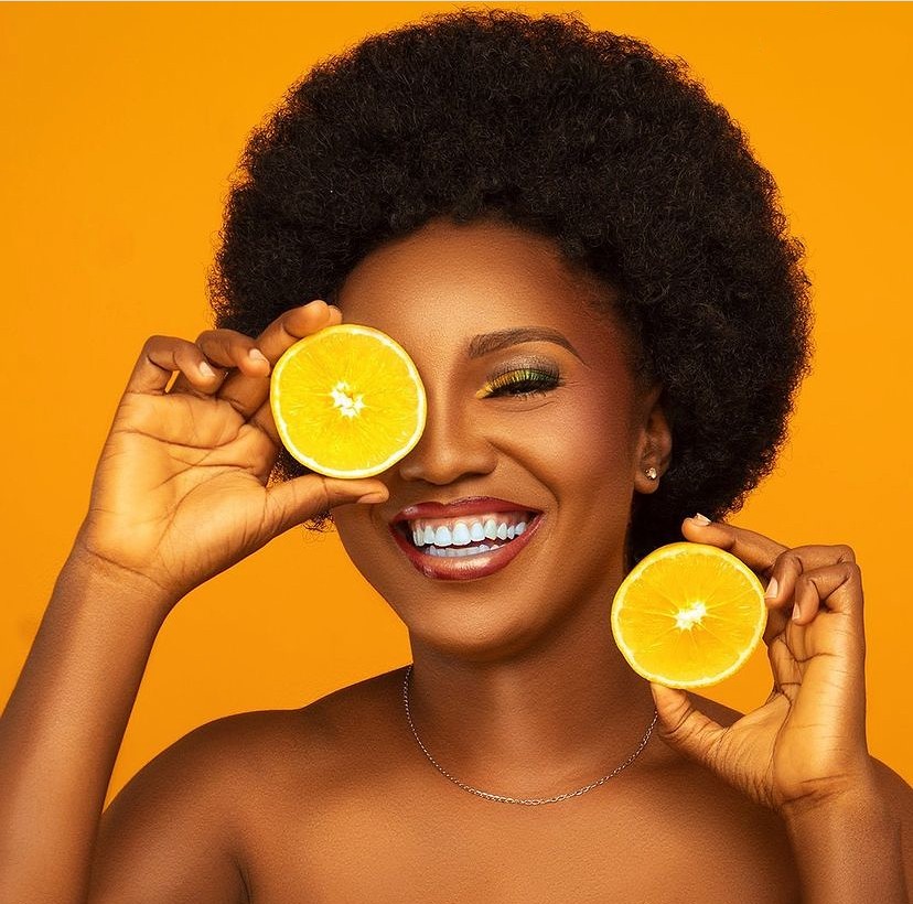 model with sliced orange fruit - Cabrini Studios